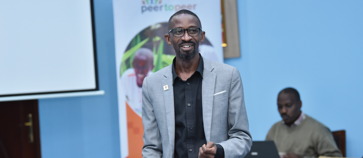 A moment of celebration at a PEERU program event